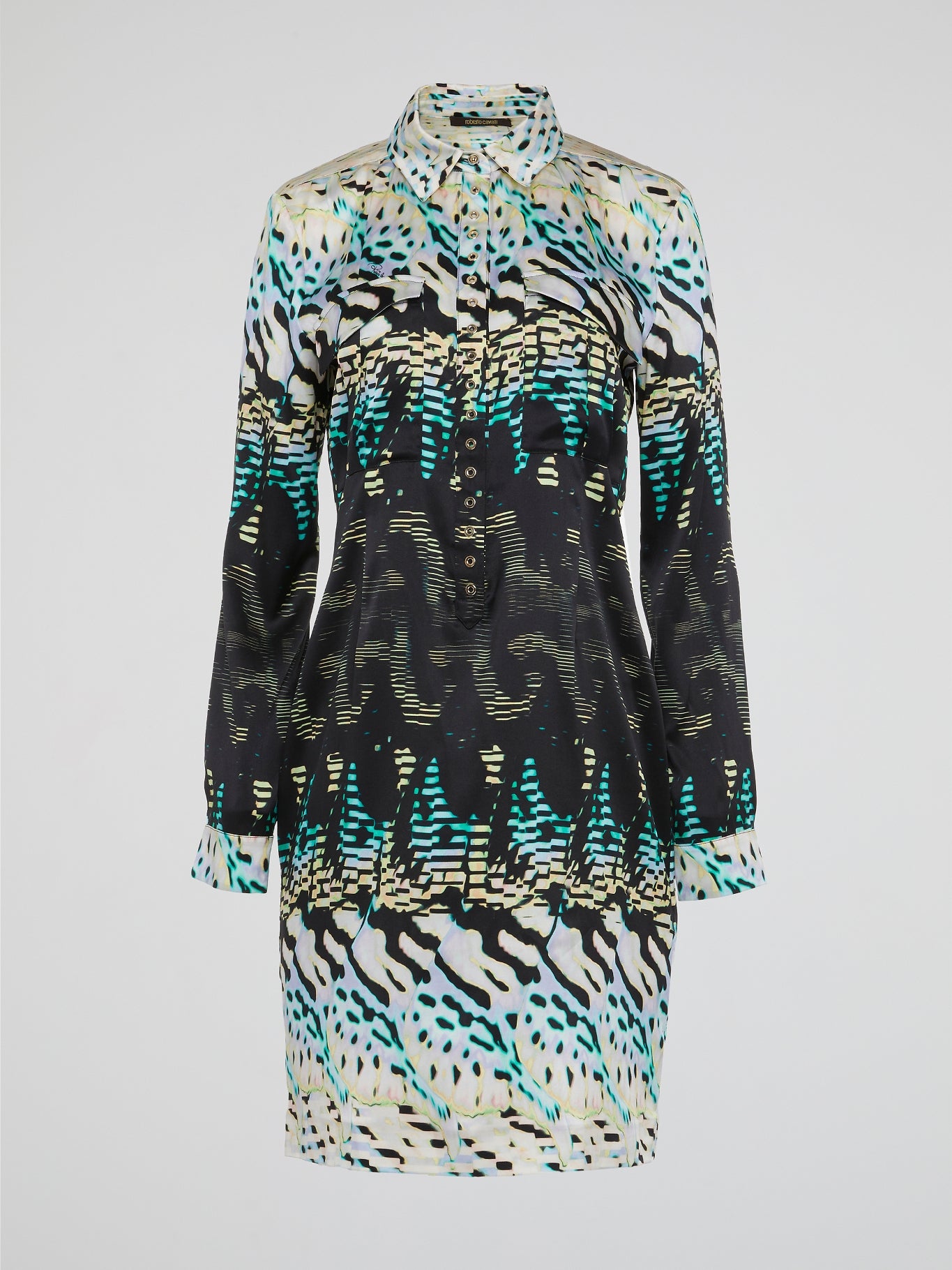 Get into the ultimate style with the Roberto Cavalli Printed Shirt Dress, a masterpiece that will elevate your wardrobe to new heights. Made with luxurious fabric and featuring a captivating print, this dress exudes elegance and sophistication. Stand out from the crowd and turn heads wherever you go in this stunning piece of art.