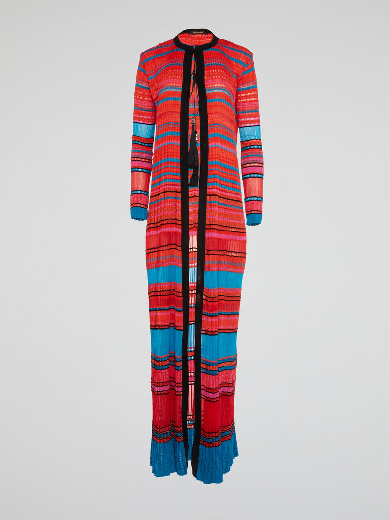 Wrap yourself in warmth and style with this luxurious knitted long coat from Roberto Cavalli. Made from the finest materials, this coat is sure to turn heads and make a statement wherever you go. Elevate your wardrobe with this unique and personal piece that is perfect for any occasion.