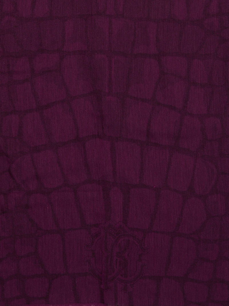 Wrap yourself in luxury with this stunning Burgundy Snake Print Scarf by Roberto Cavalli. Made from the finest materials, this scarf features a bold and captivating design that will elevate any outfit. Stand out from the crowd and exude confidence and style with this must-have accessory.