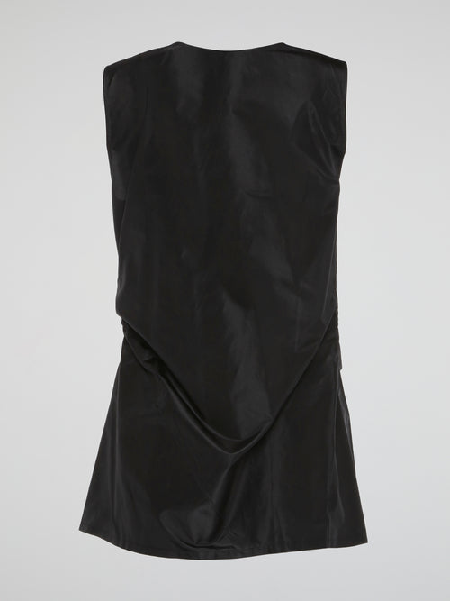 Elevate your wardrobe with the sophisticated elegance of the Black Tie Front Top from Roberto Cavalli. Crafted from the finest materials, this top exudes luxury and style with its sleek silhouette and timeless black hue. Make a statement at any event with this versatile piece that will turn heads and leave a lasting impression.