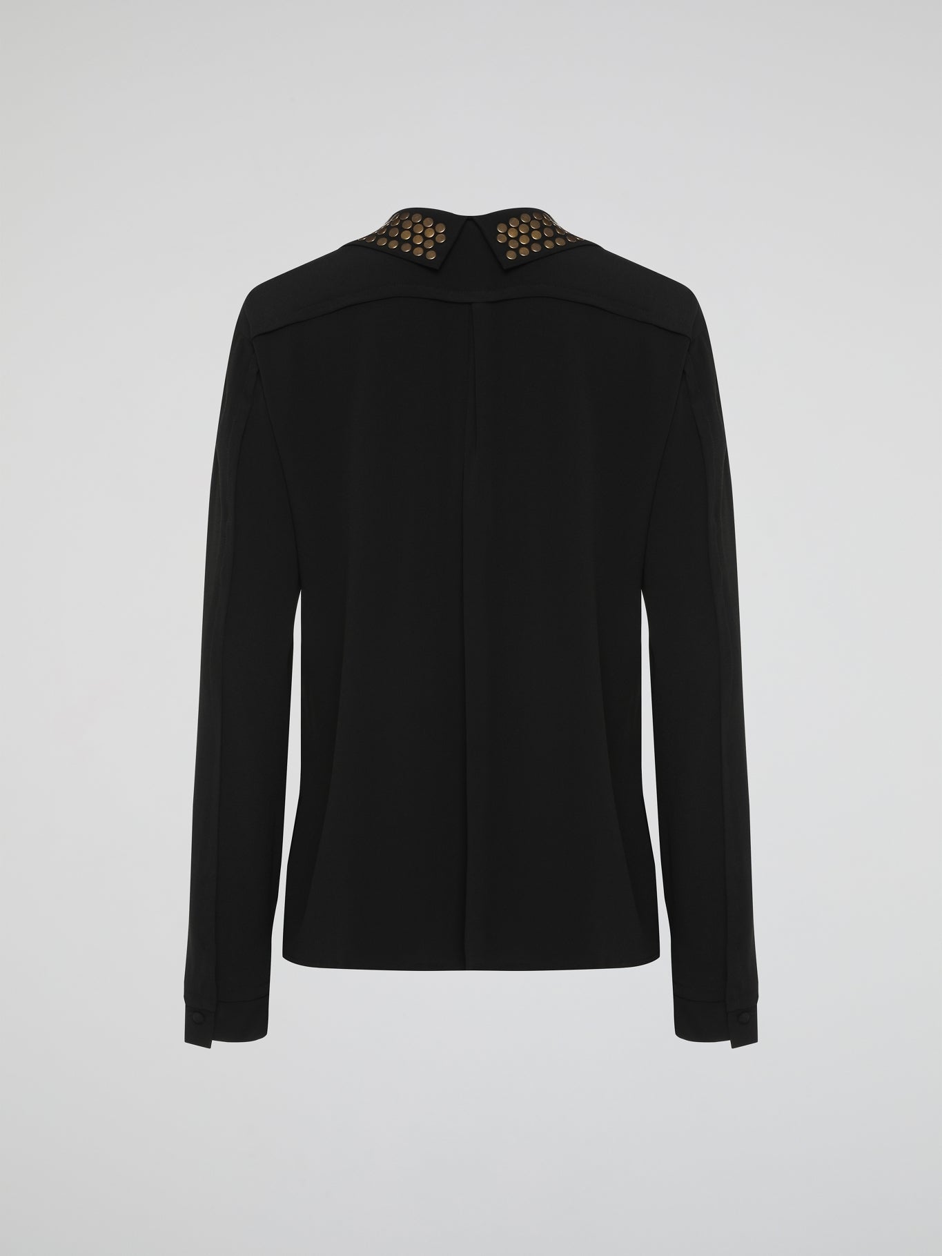 Step into the world of fierce elegance with the Black Studded Collar Blouse by Roberto Cavalli. This extraordinary piece effortlessly combines edgy appeal with timeless sophistication, making it a versatile addition to any wardrobe. With its luxurious fabric, daring studded collar, and impeccable craftsmanship, this blouse is a bold statement that exudes confidence and pushes boundaries.