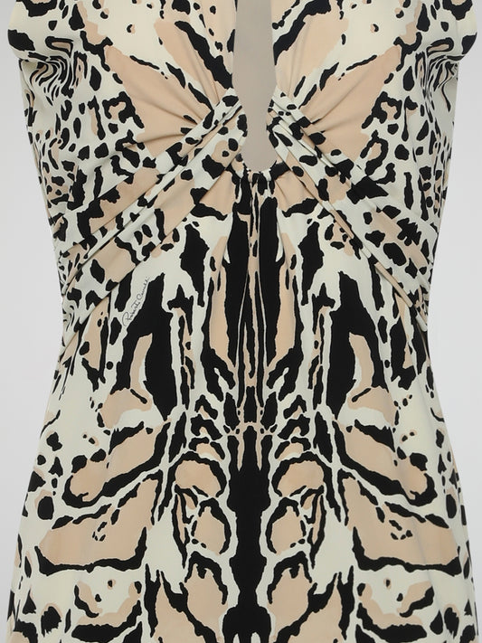 Introducing the Animal Print Keyhole Dress by legendary designer Roberto Cavalli - a fierce and captivating ensemble that will unleash the wild within you. Crafted with exquisite attention to detail, this dynamic piece features a sensuous keyhole neckline and bold animal prints that exude untamed confidence. Pair it with your favorite statement accessories and prepare to make a fierce fashion statement wherever you go.