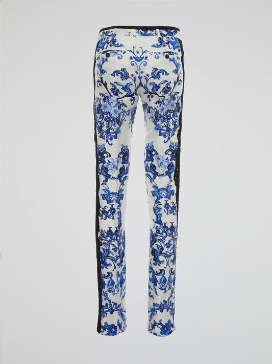 Step into a world of opulence and grandeur with our Baroque Print High-Waist Pants by Roberto Cavalli. Crafted to perfection, these pants feature a mesmerizing interplay of swirling patterns and rich colors that effortlessly capture the essence of the baroque era. Designed to accentuate your curves and elevate your style, these pants are a luxurious addition to any fashion-conscious individual's wardrobe.
