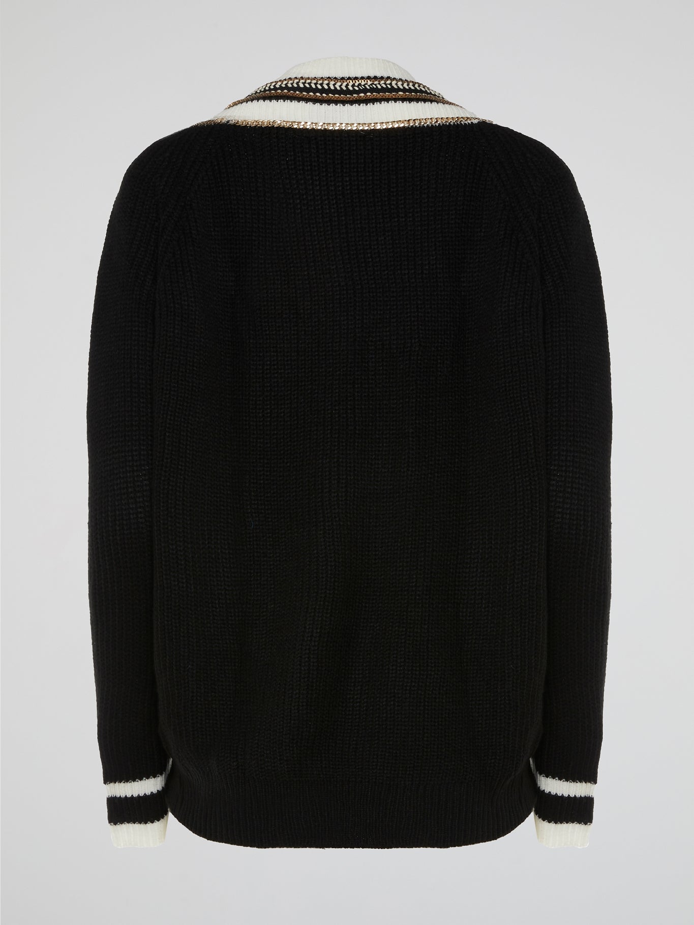 Introducing the Chain Embellished Sweater by Ella Luna - a sartorial masterpiece that effortlessly balances elegance and edginess. This captivating garment showcases a luxurious, soft-knit fabric, adorned with delicate chains strategically placed along the shoulders, adding a touch of glamour and intrigue. Perfect for fashion-forward individuals who dare to embrace their unique style, this sweater will effortlessly elevate any outfit, making you the epitome of sophistication wherever you go.