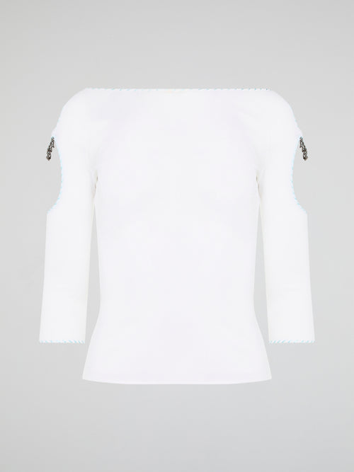 Elevate your everyday wardrobe with this stunning White Cut Out Top from Roberto Cavalli. Crafted from luxurious, high-quality materials, this top features intricate cut out detailing that adds a touch of edge and sophistication to any outfit. Perfect for day or night, this versatile piece is a must-have addition to your fashion collection.