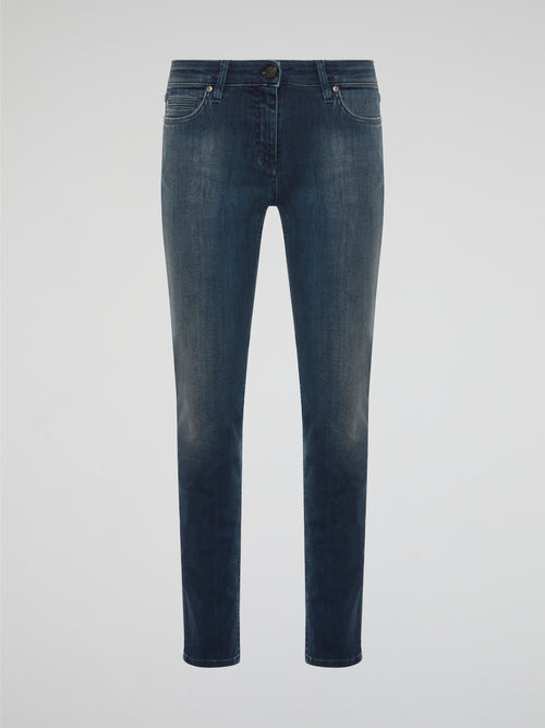Elevate your denim game with these Stone Washed Skinny Denim Jeans by Roberto Cavalli, designed to hug your curves in all the right places. The unique stone wash finish gives these jeans a worn-in, vintage look that sets them apart from your average pair of skinny jeans. Pair them with a sleek blouse and heels for a chic and edgy urban look that will turn heads wherever you go.