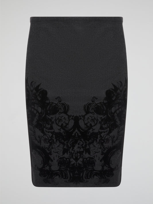 Elevate your office attire with this stunning grey printed pencil skirt from iconic designer Roberto Cavalli. The intricate pattern adds a touch of sophistication and style, making you stand out from the crowd. Pair it with a crisp white blouse and heels for a polished and fashion-forward look that will turn heads wherever you go.