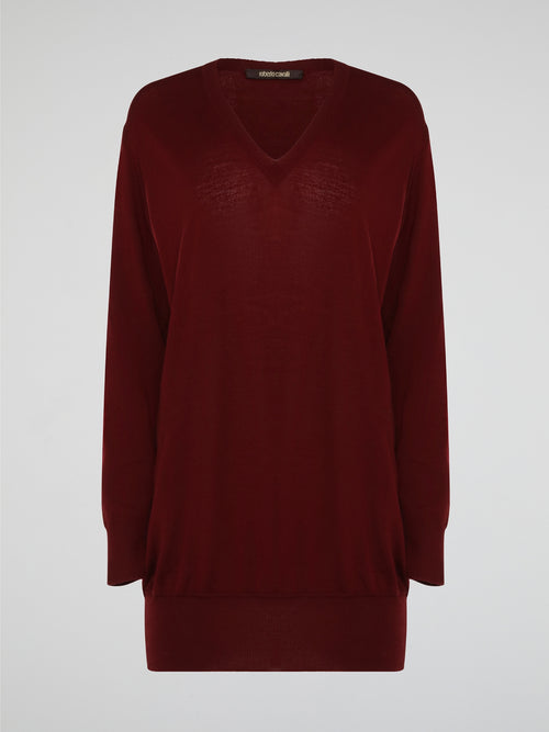 Wrap yourself in elegant luxury with this stunning Burgundy Sweater Dress by Roberto Cavalli. Made with the finest materials, this dress combines warmth and style effortlessly. Perfect for a night out or a cozy evening in, this dress will have you feeling fabulous all winter long.