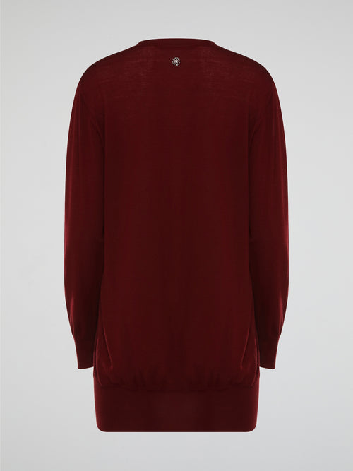 Wrap yourself in elegant luxury with this stunning Burgundy Sweater Dress by Roberto Cavalli. Made with the finest materials, this dress combines warmth and style effortlessly. Perfect for a night out or a cozy evening in, this dress will have you feeling fabulous all winter long.