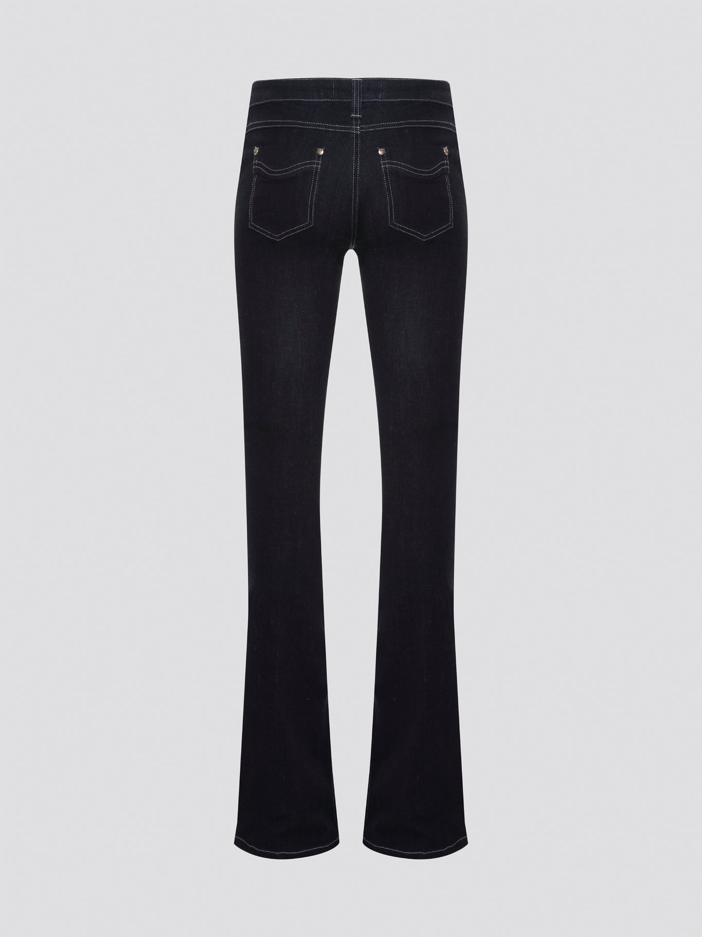 Step out in style with these Roberto Cavalli Black Contrast Stitch Flared Jeans, a modern twist on a classic silhouette. The contrast stitching adds a touch of edge to these sleek black jeans, making them a wardrobe staple for any fashion-forward individual. Pair them with a simple white t-shirt and heels for a chic and sophisticated look that will turn heads wherever you go.