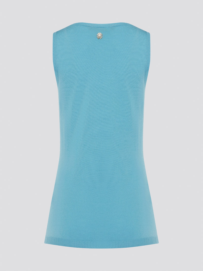 Dive into a sea of luxury with our Blue Sleeveless Top by Roberto Cavalli. Crafted from high-quality materials, this top exudes sophistication and style. Perfect for layering or wearing on its own, this top will elevate any outfit with its stunning blue hue and chic design.