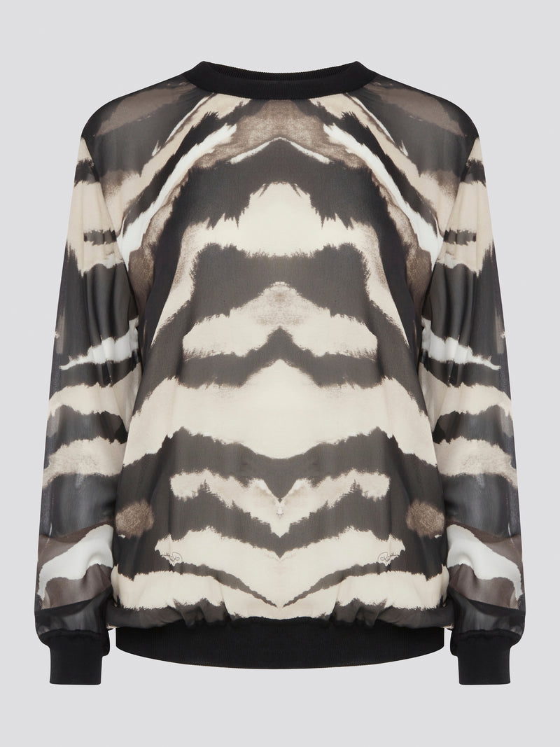 Make a fierce fashion statement with the Roberto Cavalli Zebra Print Sweatshirt, featuring a bold and eye-catching zebra print design. Crafted from premium materials, this sweatshirt offers both style and comfort for all-day wear. Elevate your street style with this standout piece that is sure to turn heads wherever you go.