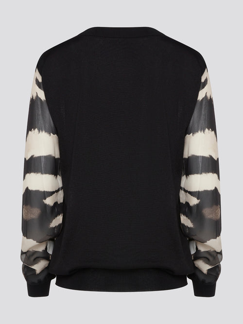 Make a fierce fashion statement with the Roberto Cavalli Zebra Print Sweatshirt, featuring a bold and eye-catching zebra print design. Crafted from premium materials, this sweatshirt offers both style and comfort for all-day wear. Elevate your street style with this standout piece that is sure to turn heads wherever you go.