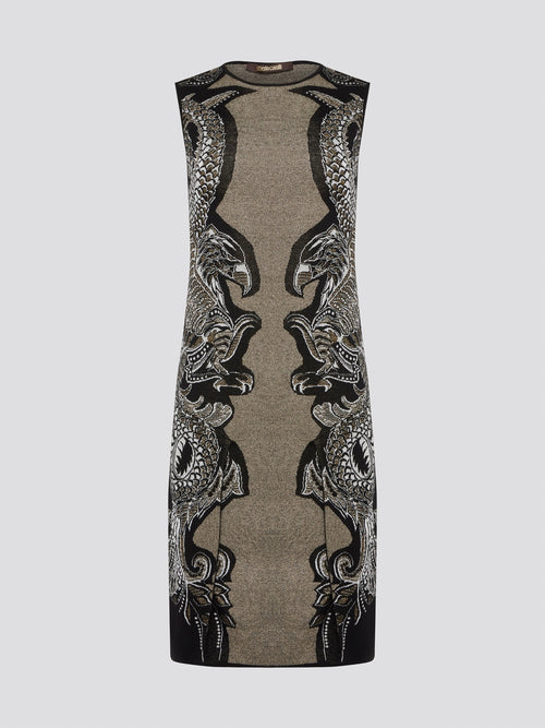 Elevate your wardrobe with the exquisite Knitted Bodycon Dress by Roberto Cavalli. Crafted with precision and care, this dress features intricate knitted details that hug your curves in all the right places. Make a statement at any event with this luxurious and unique piece that exudes elegance and style.